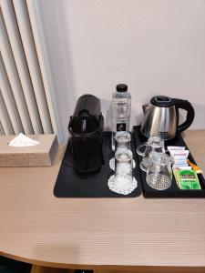 Все необхідне для приготування чаю та кави в Trend Apart Hotel