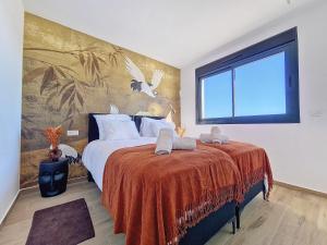 a bedroom with a large bed with a large window at Los Alcazares Velapi - 0510 in San Javier +43 photos