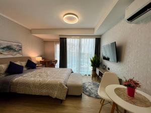 Televisor o centre d'entreteniment de One Sweet