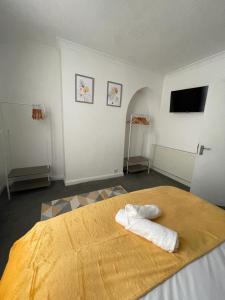 Katil atau katil-katil dalam bilik di Contractor & Family House - Central Grantham
