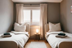 Postel nebo postele na pokoji v ubytování Design Apartment 128qm mit Ausblick