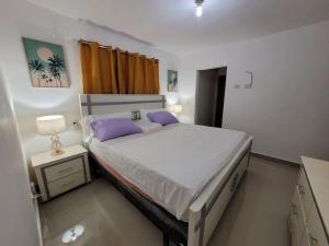 เตียงในห้องที่ El mejor alojamiento en Santiago +23 ภาพ