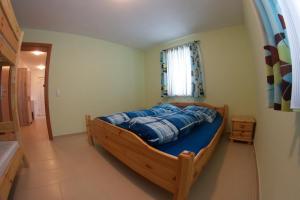 Ferienwohnung Radmer tesisinde bir odada yatak veya yataklar