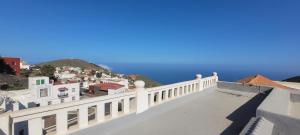 a view of a city from the balcony of a building at Vivienda El Viajero in Valverde