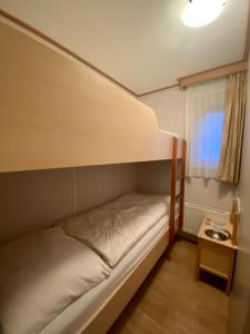 Postel nebo postele na pokoji v ubytování Chalet Seazon R23