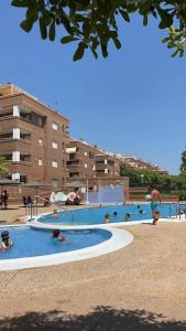 The swimming pool at or close to Apartamento vacacional cerca al mar - OROPESA DEL MAR