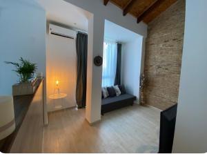 Posteľ alebo postele v izbe v ubytovaní VALENCIA RENT APARTS MILAGROSA 1