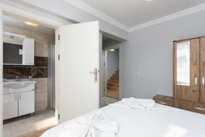 Postel nebo postele na pokoji v ubytování Villa Ada 2
