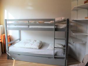 a bunk bed room with two bunk beds in it at Appartement Vars, 1 pièce, 4 personnes - FR-1-330B-189 in Vars