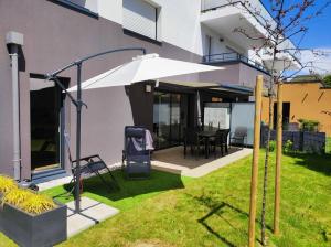 Κήπος έξω από το TI YUSA Appartement Jardin à Concarneau