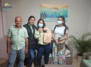 a group of people wearing masks posing for a picture at Apartamento cómodo y confortable in San Andrés