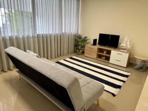 TV a/nebo společenská místnost v ubytování Olá Mar