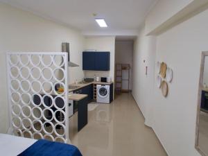 Kuchyň nebo kuchyňský kout v ubytování Olá Mar