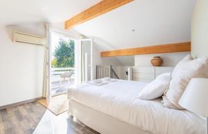 Ένα ή περισσότερα κρεβάτια σε δωμάτιο στο VILLA CLAIRE à ANDERNOS