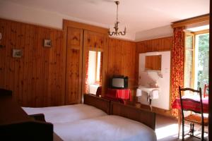 Postelja oz. postelje v sobi nastanitve Hôtel Hermitage