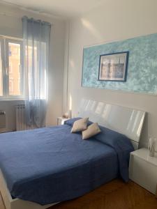 Postel nebo postele na pokoji v ubytování SoleMare Rooms Trieste