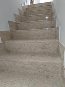 a set of stone stairs in a house at Buen Retiro - Bellona in Bellona