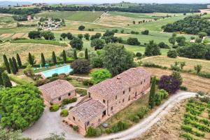 an aerial view of an estate with a swimming pool at Agriturismo I Fuochi in Valiano