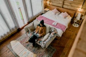 Letto o letti in una camera di Satha private villa Dieng