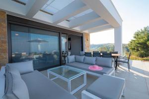 A seating area at Bellevue Villas with private pool