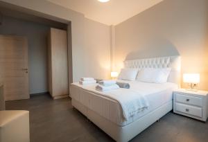 A bed or beds in a room at Bellevue Villas with private pool