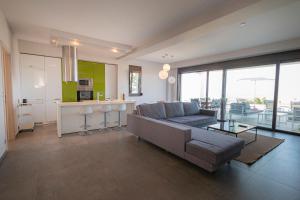 A kitchen or kitchenette at Bellevue Villas with private pool