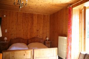 Postelja oz. postelje v sobi nastanitve Hôtel Hermitage