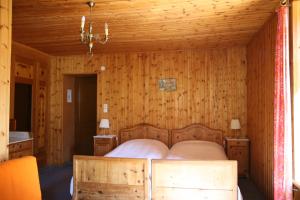 Postelja oz. postelje v sobi nastanitve Hôtel Hermitage