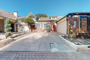 a house with a driveway with a garage at Restful City Living, Unit B in Dallas