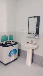 Ванная комната в Sunrise Relax Inn