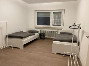 Postel nebo postele na pokoji v ubytování MSC Lampertheim