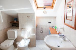 A bathroom at La Terrazza sul Mare