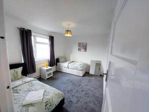Postel nebo postele na pokoji v ubytování 3 bedroom Flat in Hoxton London
