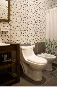 Koupelna v ubytování La Blanquita + 10 fotografií