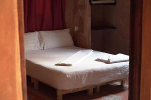 Postel nebo postele na pokoji v ubytování CHEZ MANAR