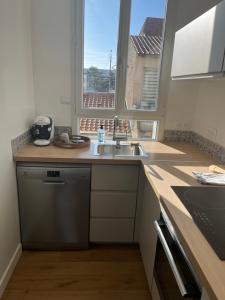 Afbeelding uit fotogalerij van Appartement à 200 m de la mer in Merlimont