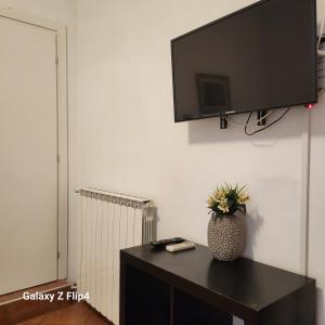 TV a/nebo společenská místnost v ubytování SweetHouseVittorio + 9 fotografií