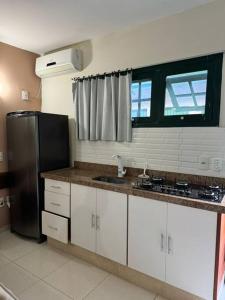 A cozinha ou kitchenette de Suíte proxima ao centro histórico Paraty