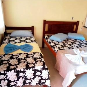 Cama ou camas em um quarto em Pousada Cuiarana Salinas