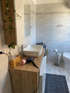 Koupelna v ubytování Civita Home Experience + 23 fotografií