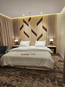 Postel nebo postele na pokoji v ubytování فندق سي قل - Sea gull Hotel