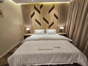 Postel nebo postele na pokoji v ubytování فندق سي قل - Sea gull Hotel