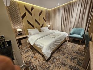 Postel nebo postele na pokoji v ubytování فندق سي قل - Sea gull Hotel