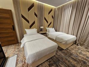 Postel nebo postele na pokoji v ubytování فندق سي قل - Sea gull Hotel