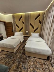 Postel nebo postele na pokoji v ubytování فندق سي قل - Sea gull Hotel