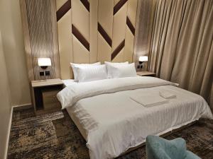 Postel nebo postele na pokoji v ubytování فندق سي قل - Sea gull Hotel