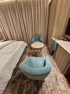 Postel nebo postele na pokoji v ubytování فندق سي قل - Sea gull Hotel