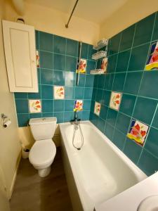 Ванная комната в La Mongie - Apt 2 ch - 8 pers - Place parking couvert