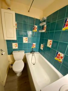 Kúpeľňa v ubytovaní BLocation - La Mongie - Apt 2 ch - 8 pers - Place parking couvert - Ménage en suppl