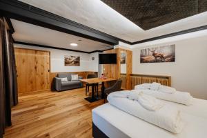 Postel nebo postele na pokoji v ubytování Hotel Rupertihof